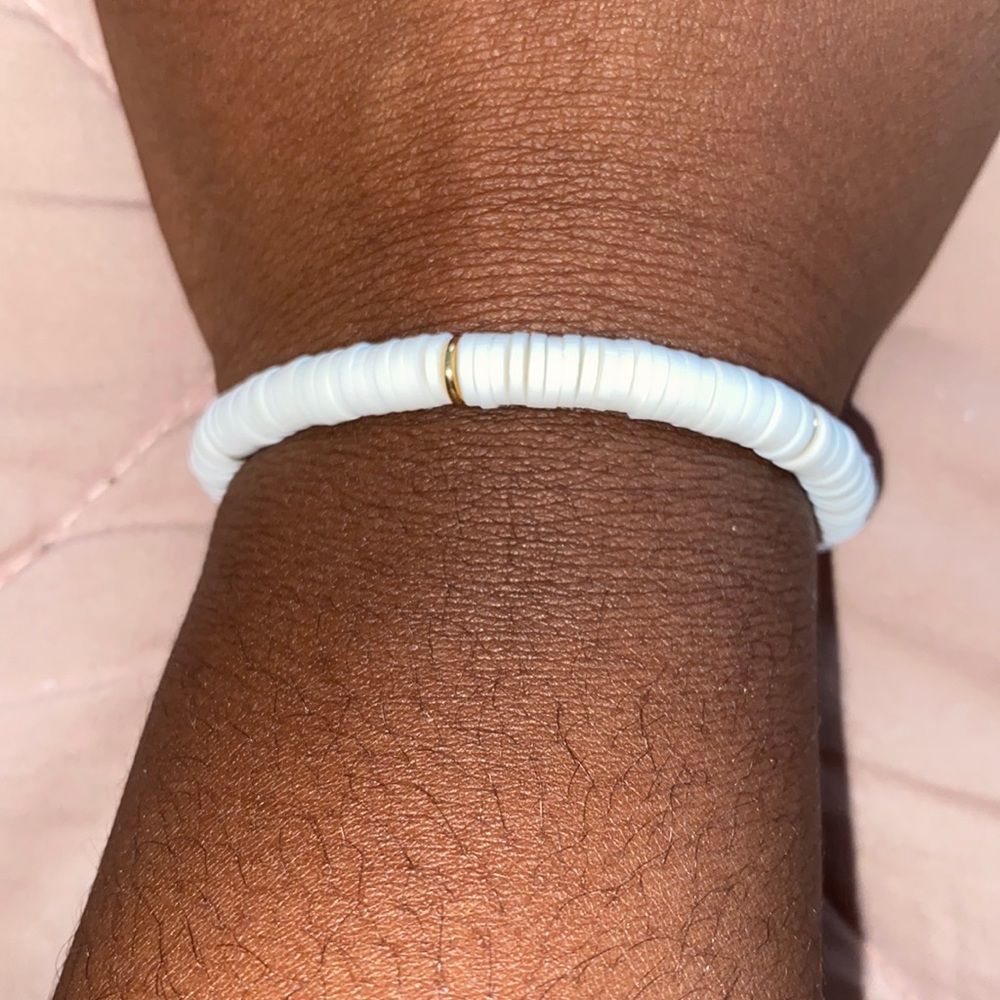 white and gold bracelet